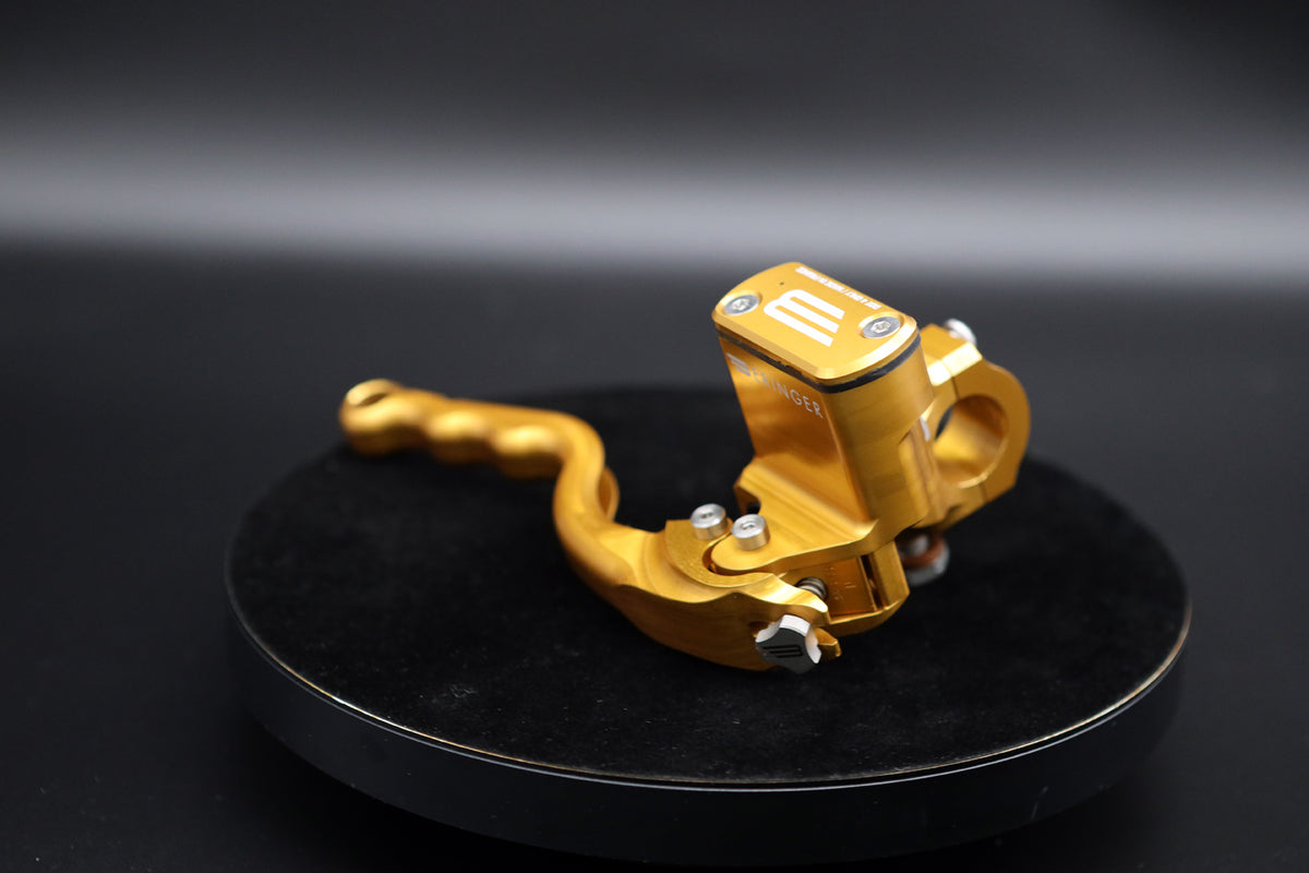 Beringer BRO radial brake master cylinder in gold